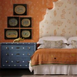 Over The Moon Denim Fabric -Home Furni and Decor Sale 215877 lucifer headboard upholstered in friendly folk melon orange fabric against wychwood melon orange wallpaper with chest of drawers in over the moon denim fabric