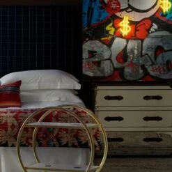 Front Page -Home Furni and Decor Sale 58469 sage headboard in wales navy with howard steelleather chest of drawers a cici bar trolley and micky mouse and monopoly man neon artwork